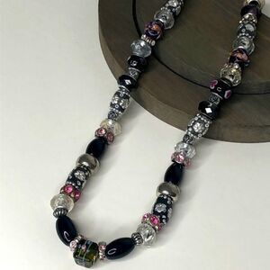 Stunning beaded necklace with glass and ceramic.
